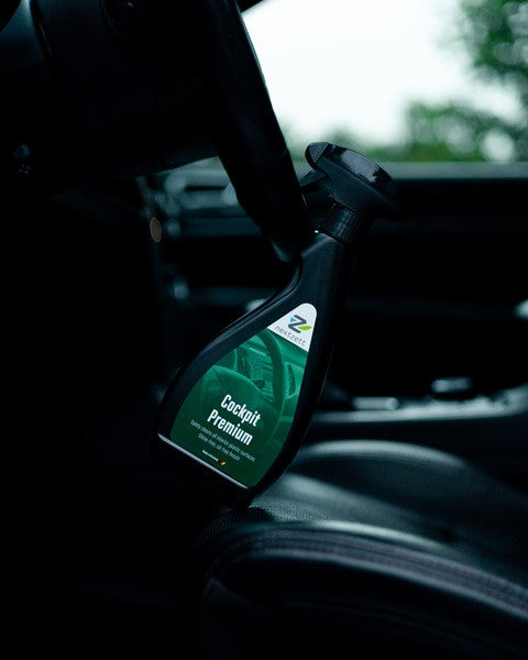nextzett Cockpit Premium resting on black leather upholstered seat of car interior