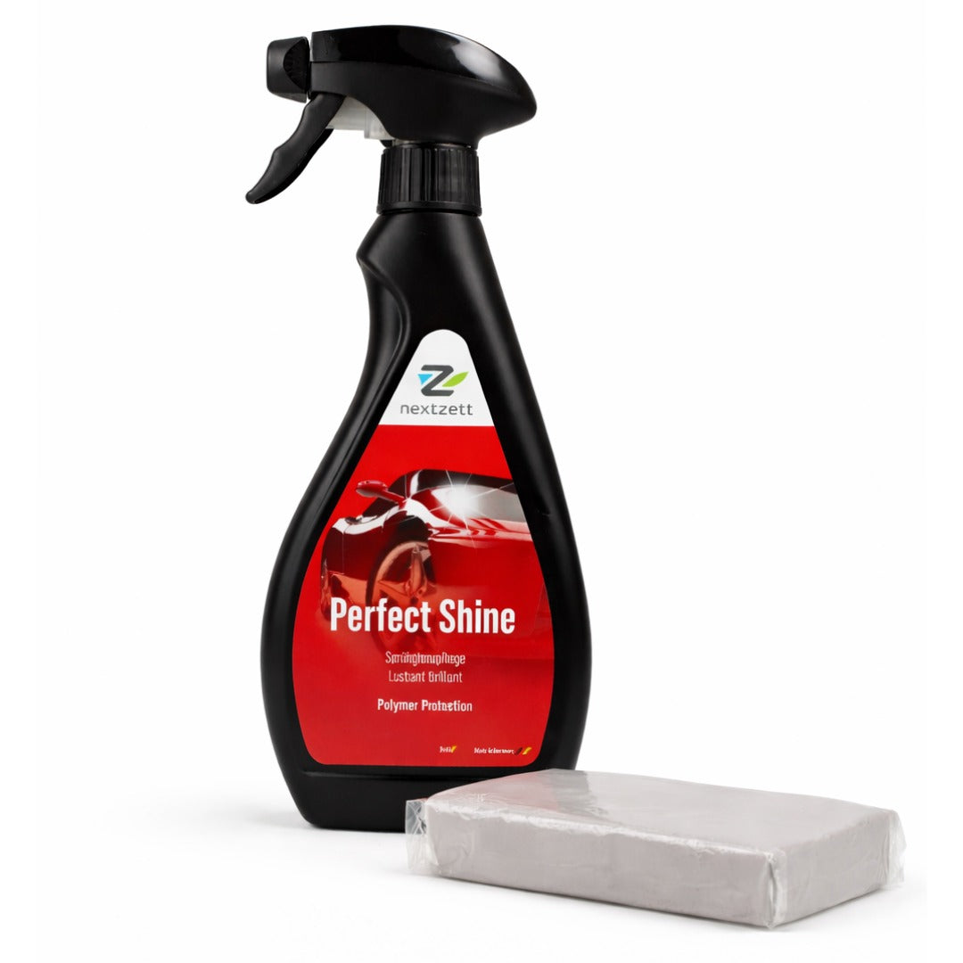 Spray bottle labeled 'Perfect Shine' with a detailing clay bar on a white background